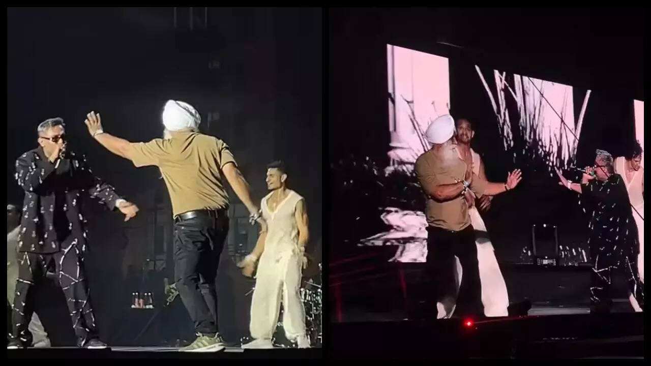 An older fan joins paaji on stage at the Kolkata finale.